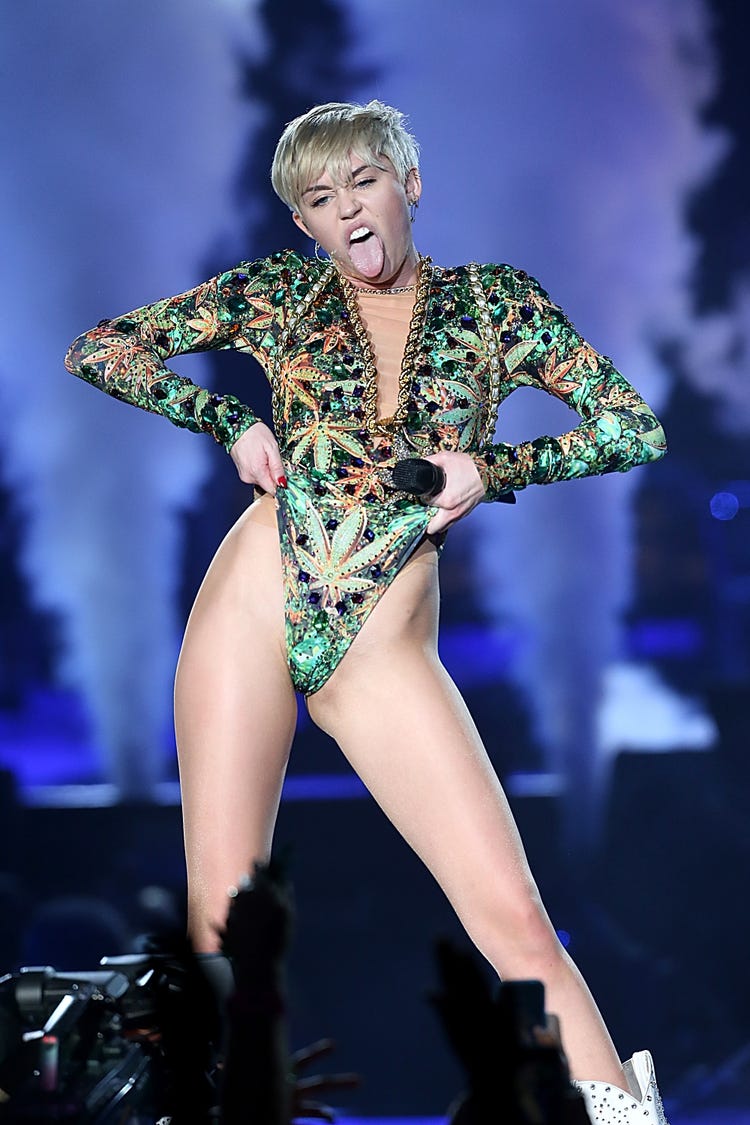 PH๏τos That Show Miley Cyrus' Wild Fashion Evolution